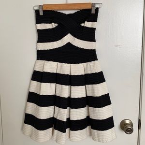 Black strapless dress. Brand: Sis . Sis